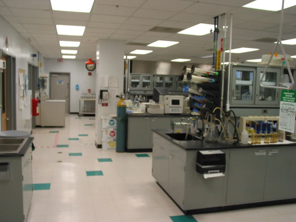 Research laboratory interior with technical equipment and workstations