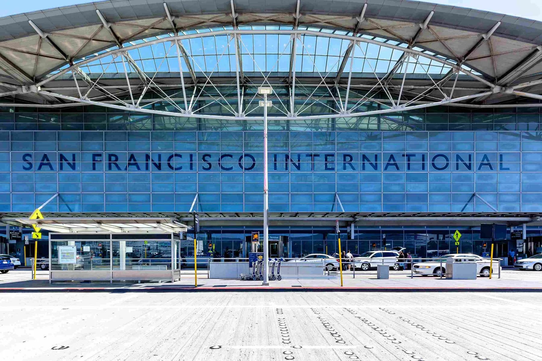 Entrance roadway and curved canopy of the San Francisco International Airport terminal